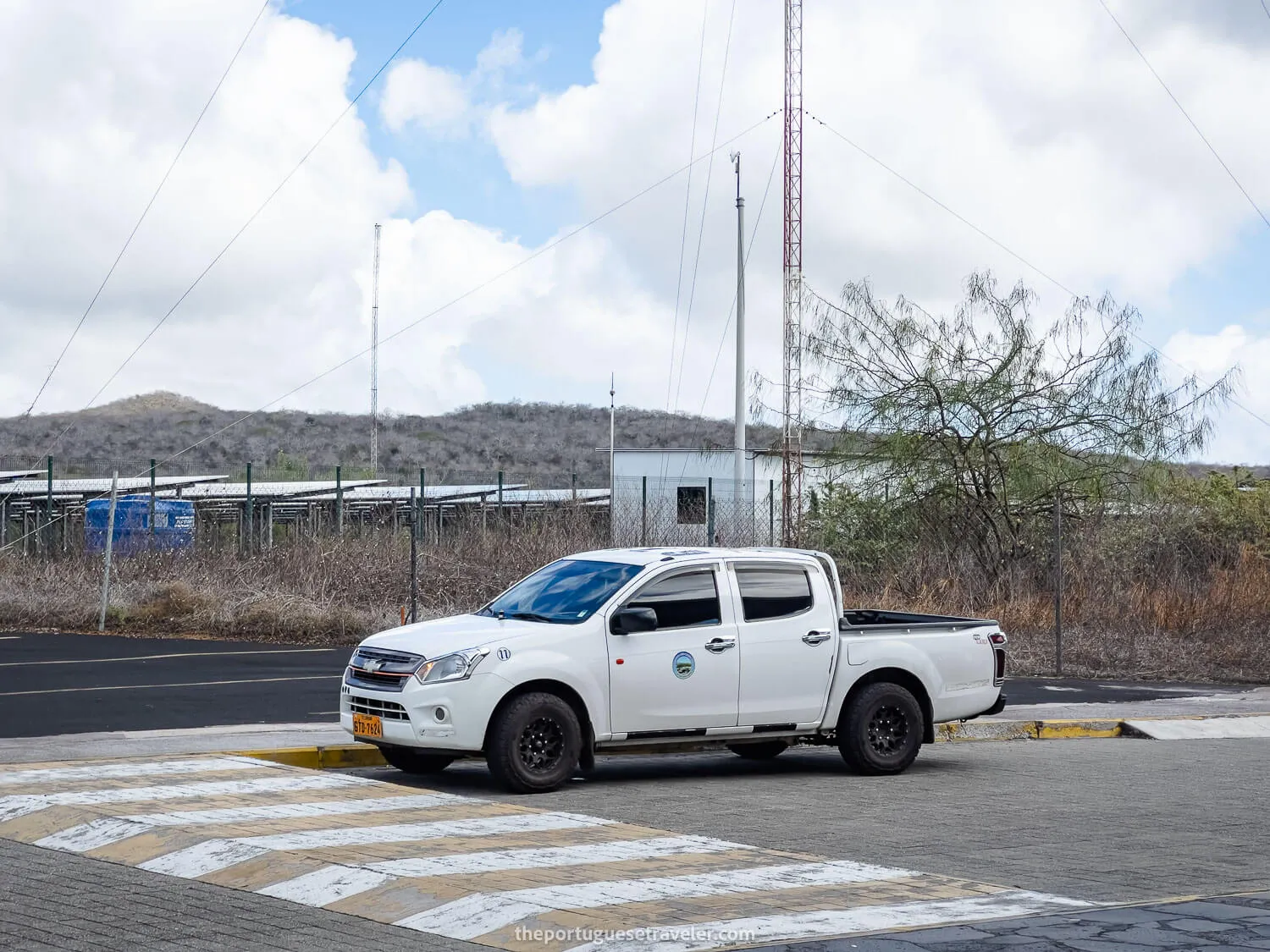 A pickup van taxi outside of the San Cristobal airport