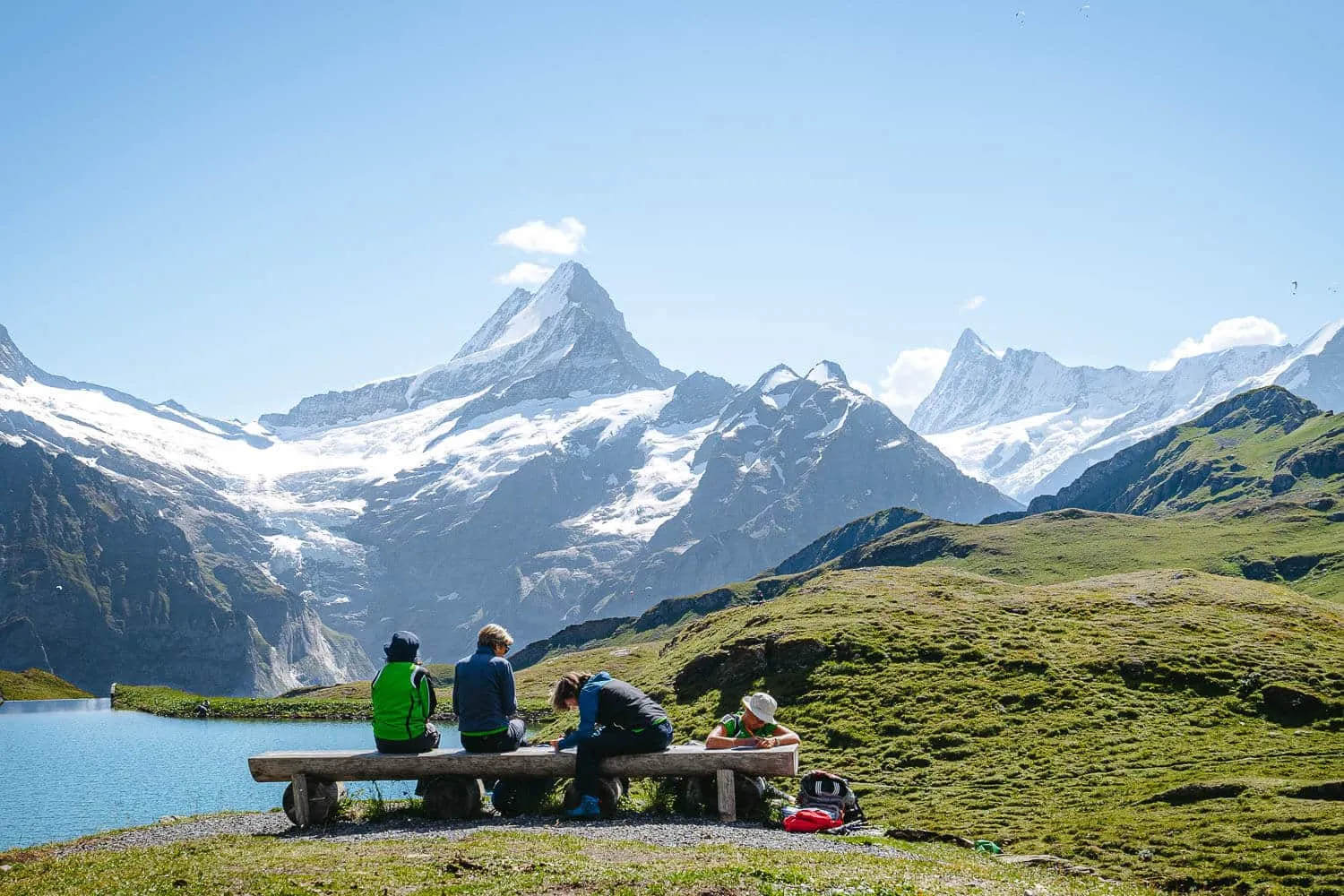 Hikers at the lake Bachalpsee