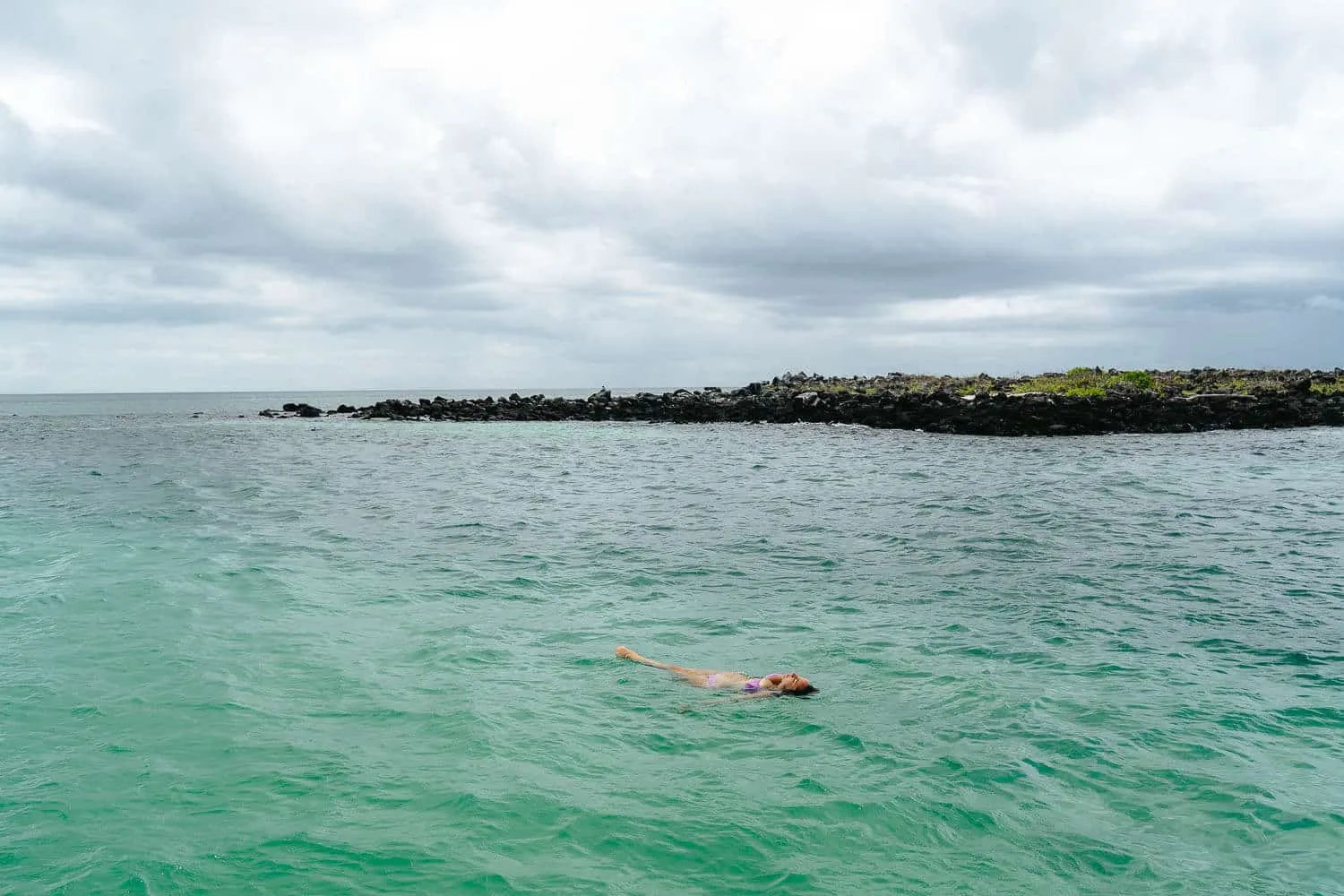 Swimming at The Bahia Sardina beach on the 360 Tour in San Cristobal