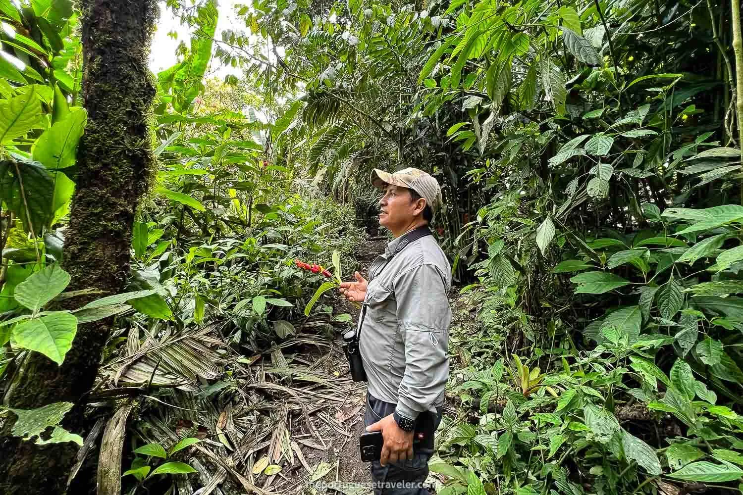 Alcivar lecturing me about the birds we were going to spot.
