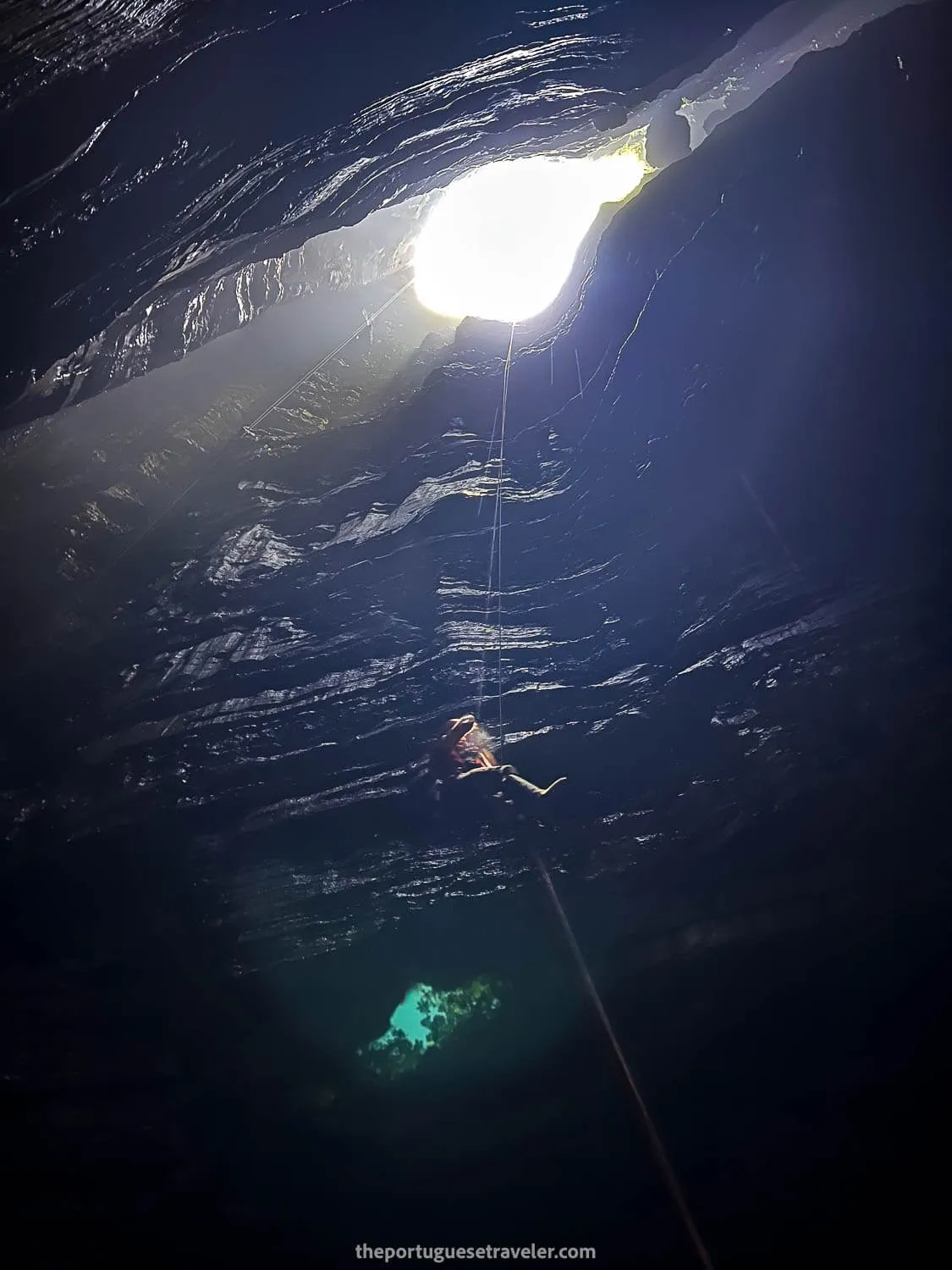 Leandro self-lifting himself up to the cave's mouth