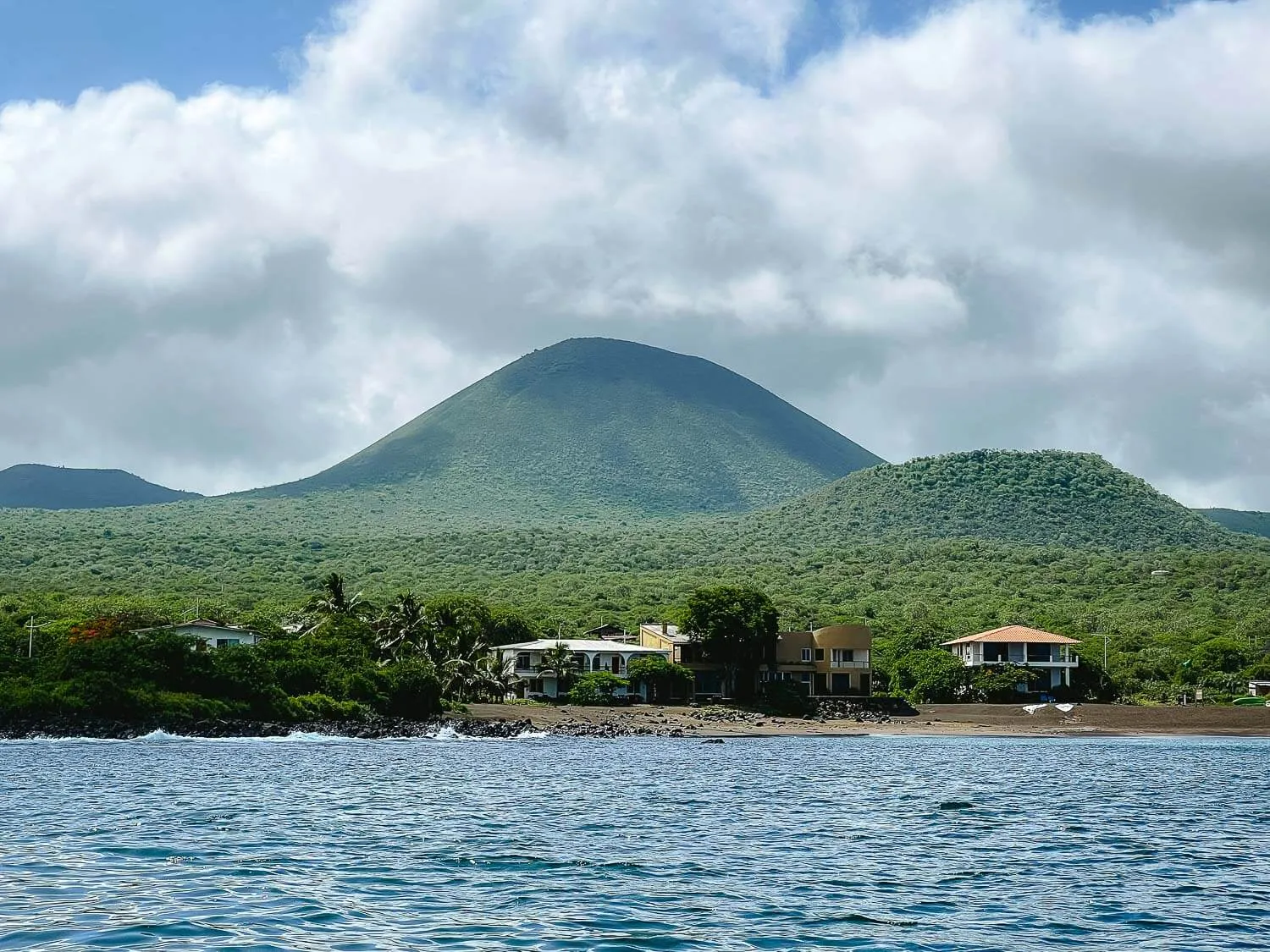 The arrival to Floreana island. The black beach and the Wittmer Lodge
