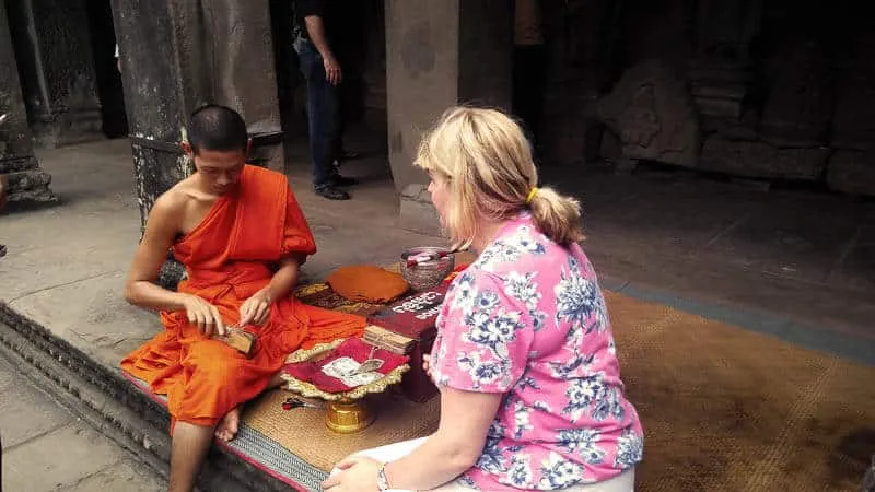 Fortune reading monk in Angkor Wat, Cambodia