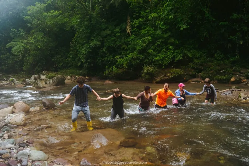 The other tourists crossing the river