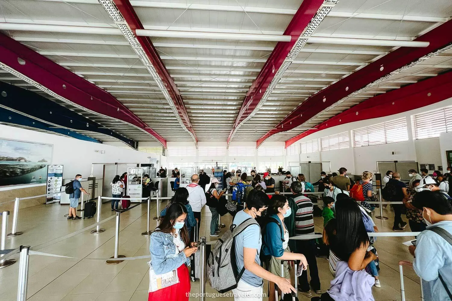 The airport control's queue in San Cristobal's Airport, the entrance requirements, one of the things to know before visiting the Galapagos Islands - Galapagos Packing List