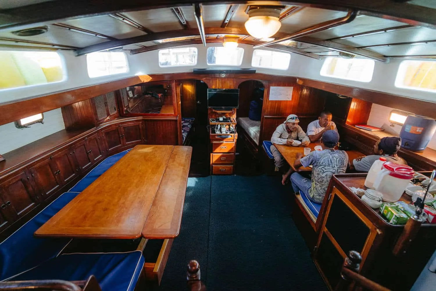 The crew having a snack in the interior of the ship