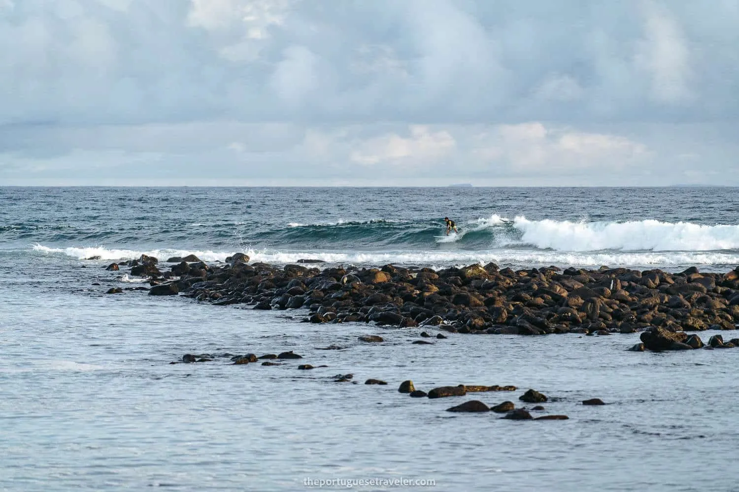 Surfing at La Loberia beach in San Cristobal