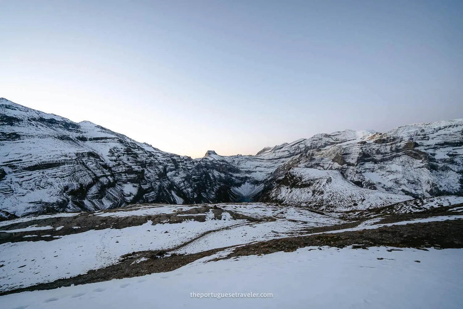 The snowy landscape at sunrise