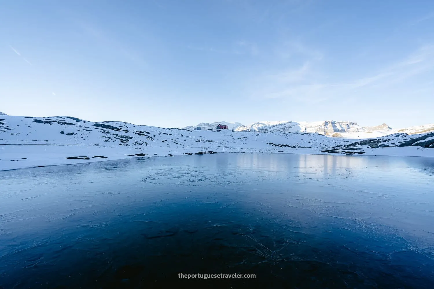 The Muttseehütte over a frozen lake