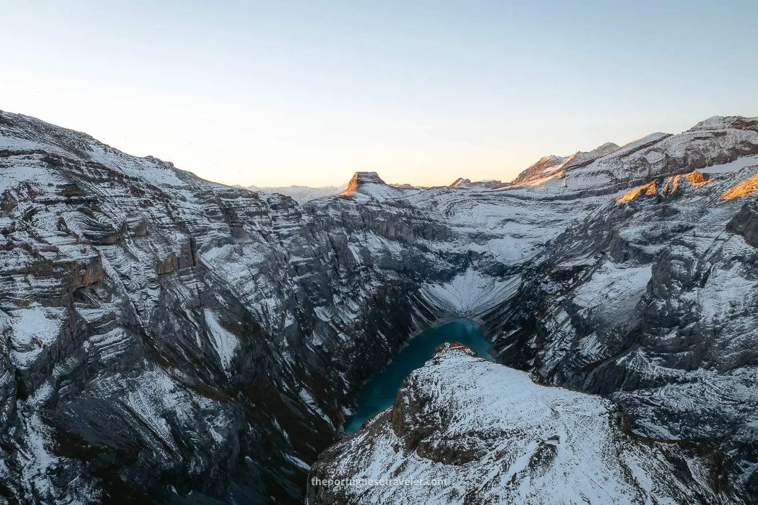 The Limmernsee Lake at sunrise with snow