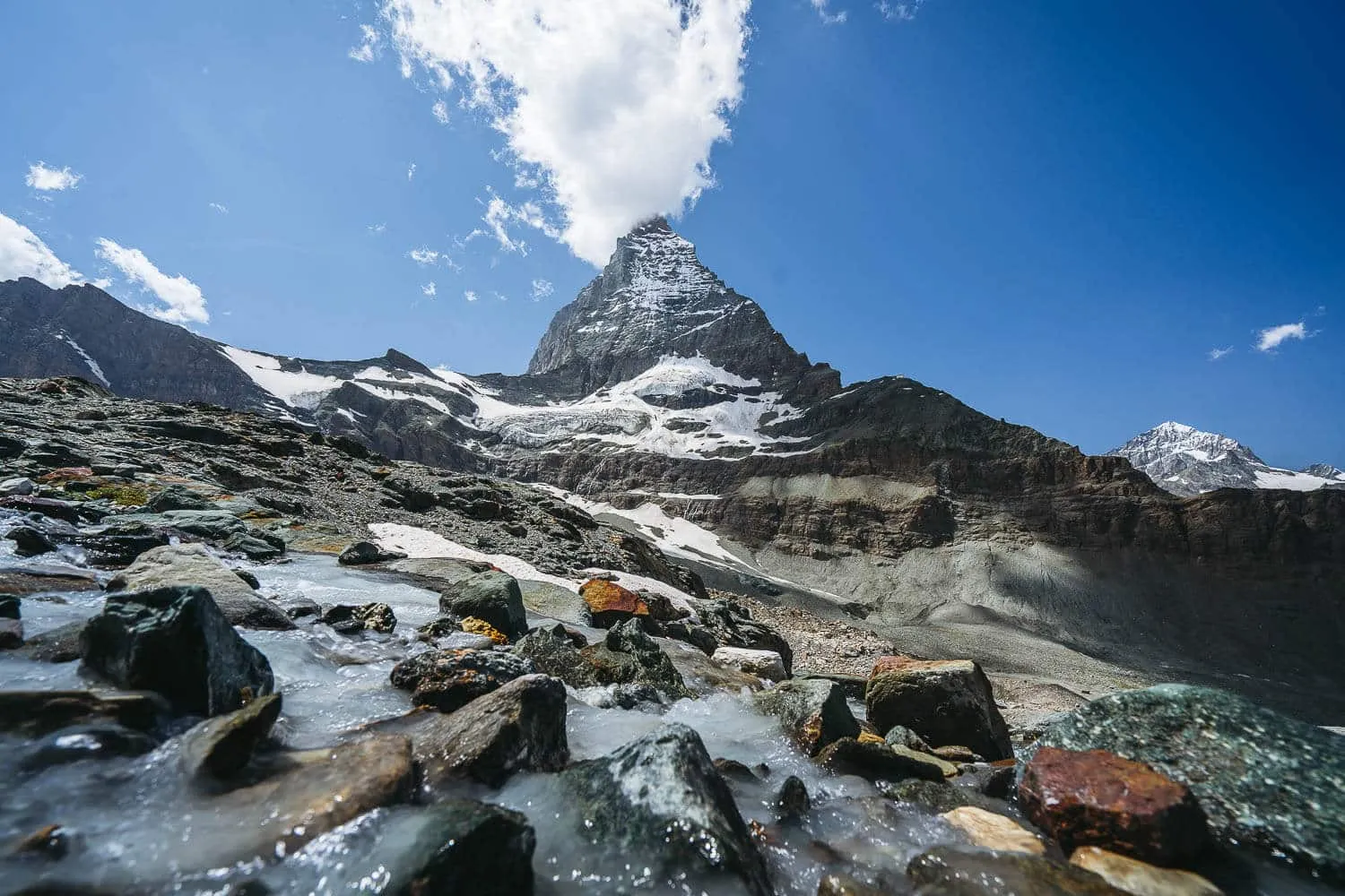 Colourful glacier river at the Matterhorn Glacier Trail