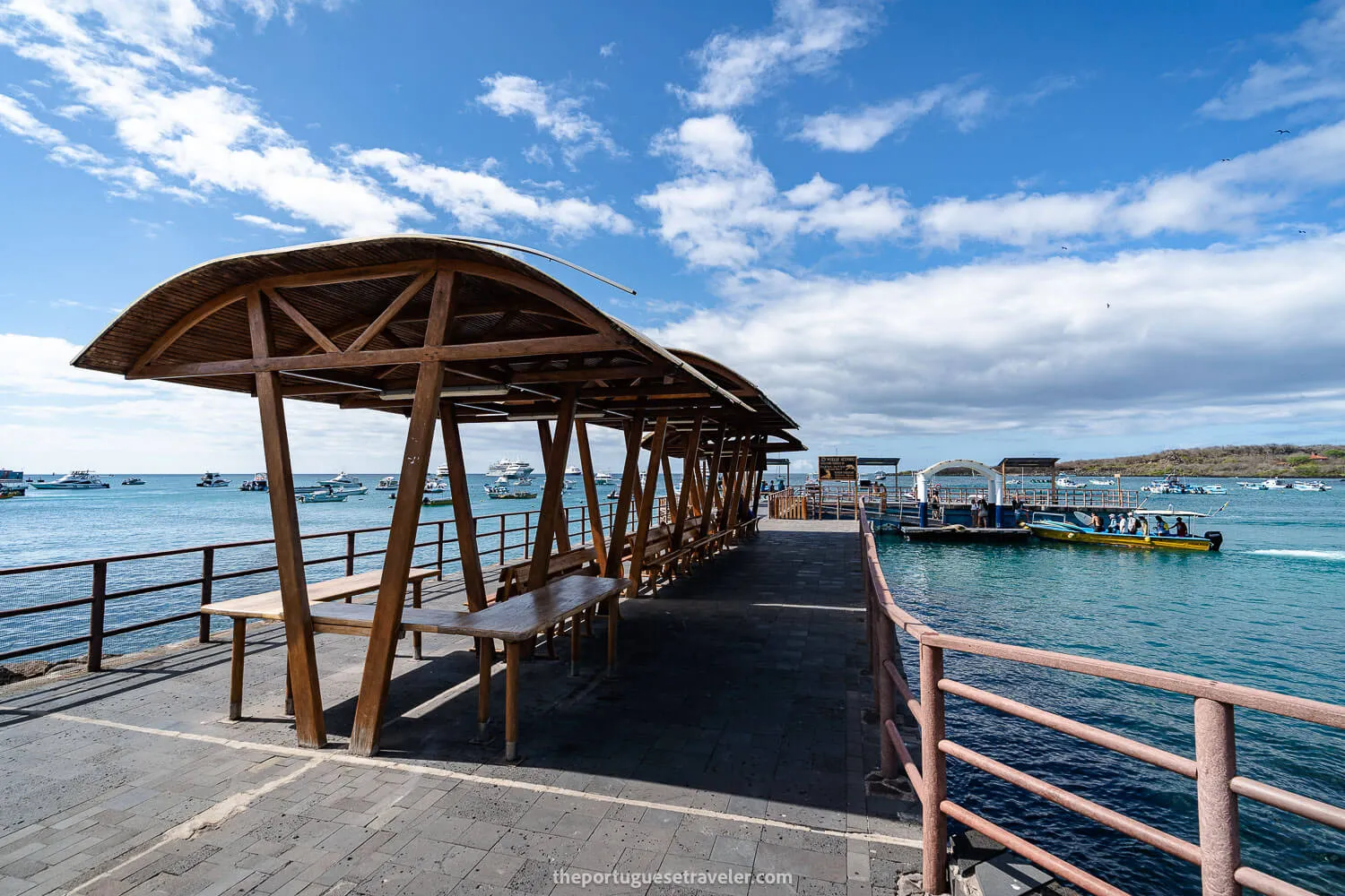 The Muelle Acuario pier with a taxi-boat