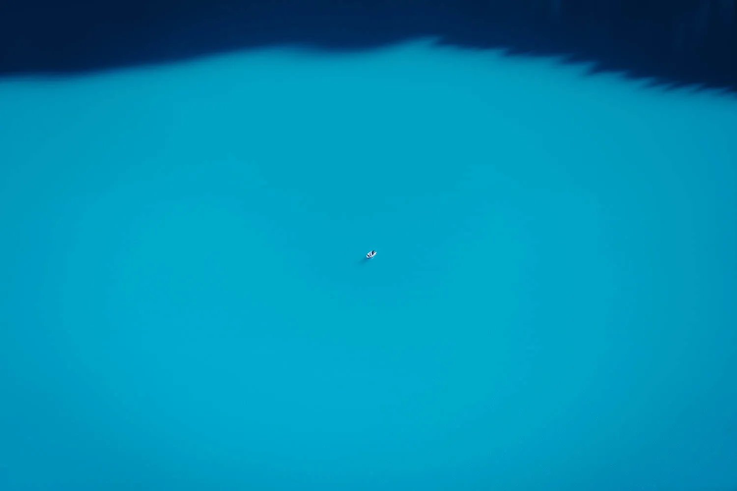 The turquoise waters of the lake