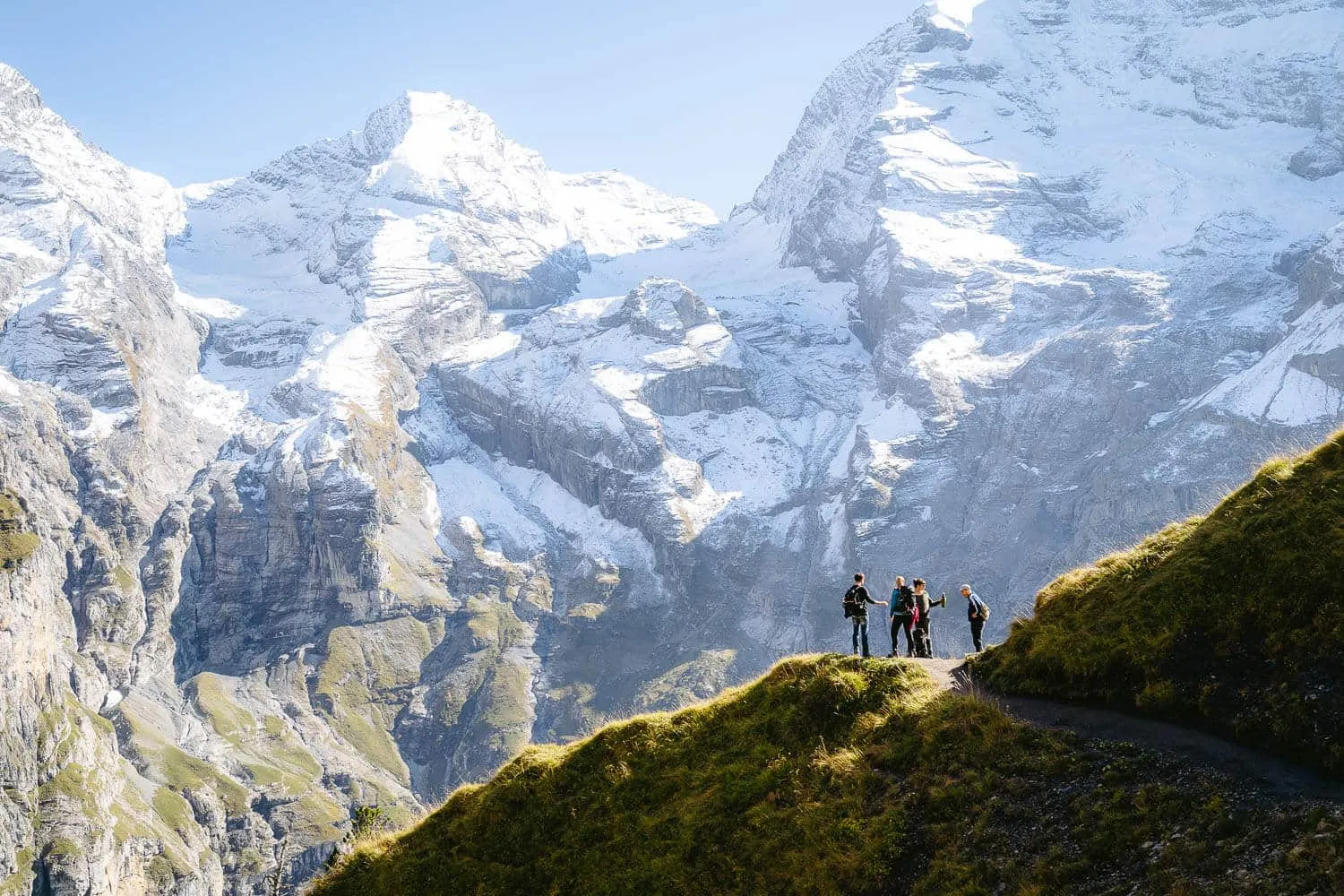 A group of hikers with the mountains on the background