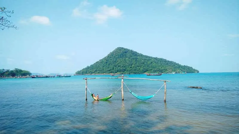 Reading Hamocks on a beach in Koh Rong Samloem, Cambodia