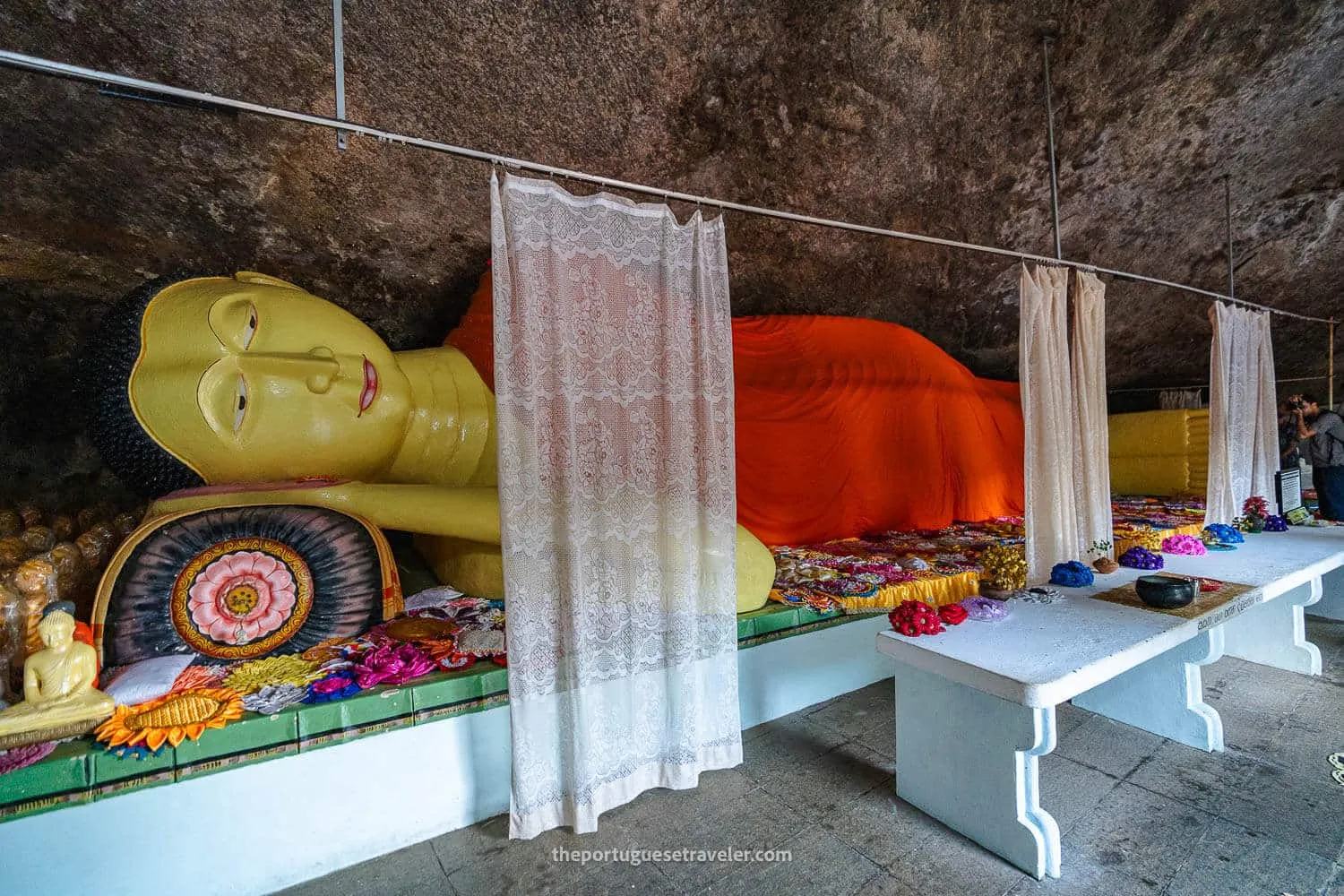 The reclining Buddha inside the hidden temple at Sithulpawwa
