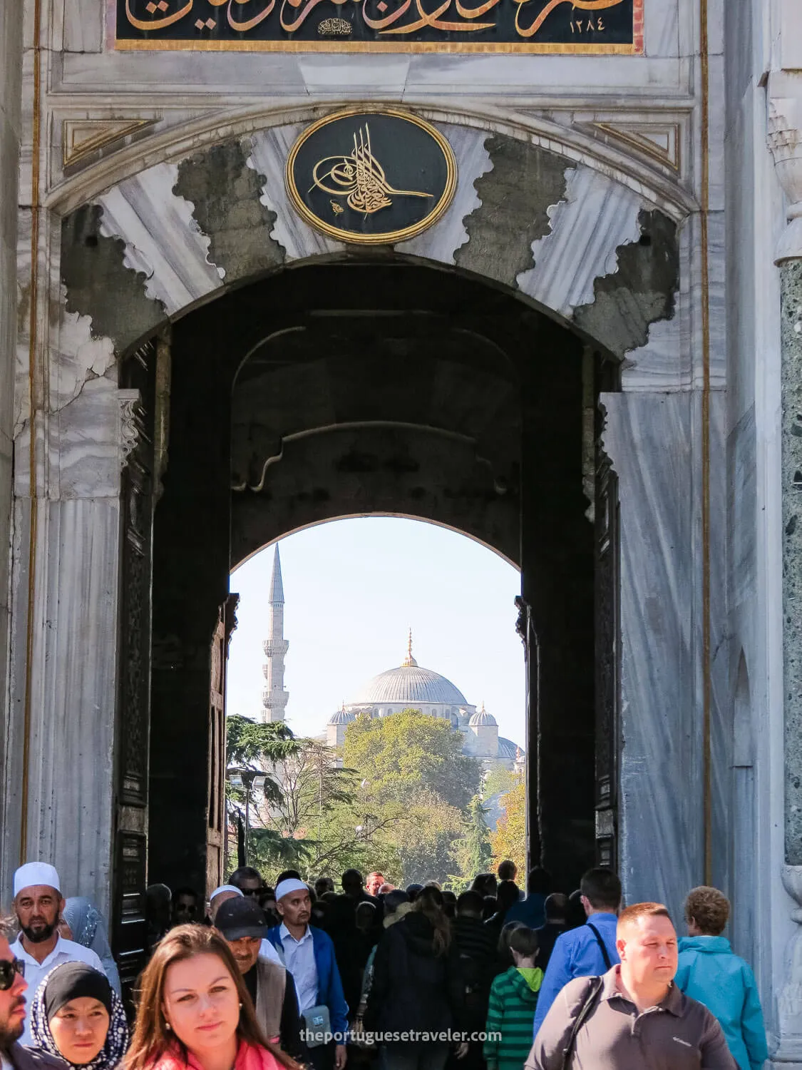 The entrance of Topkapi Palace with the Blue Mosque behind
