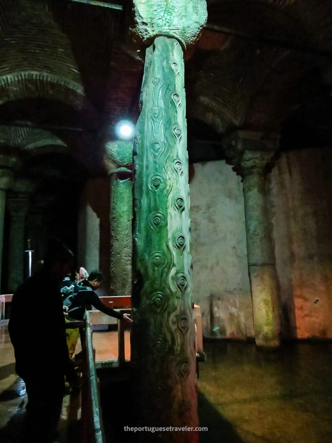 The wood details on a column inside the cistern